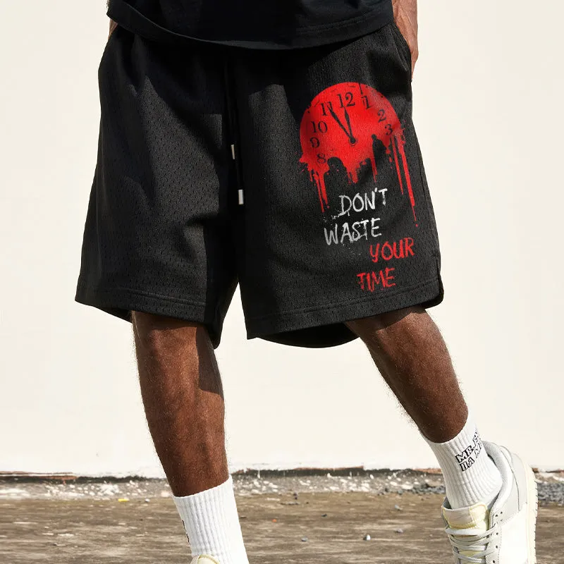 slogan-print mesh track shorts