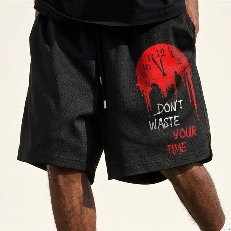 slogan-print mesh track shorts