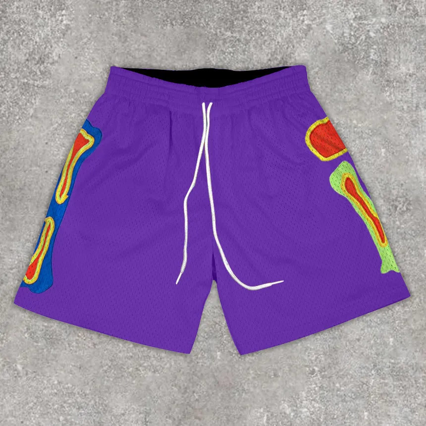 Statement bone print track shorts
