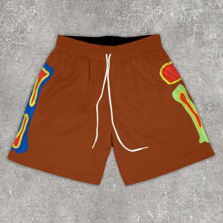Statement bone print track shorts
